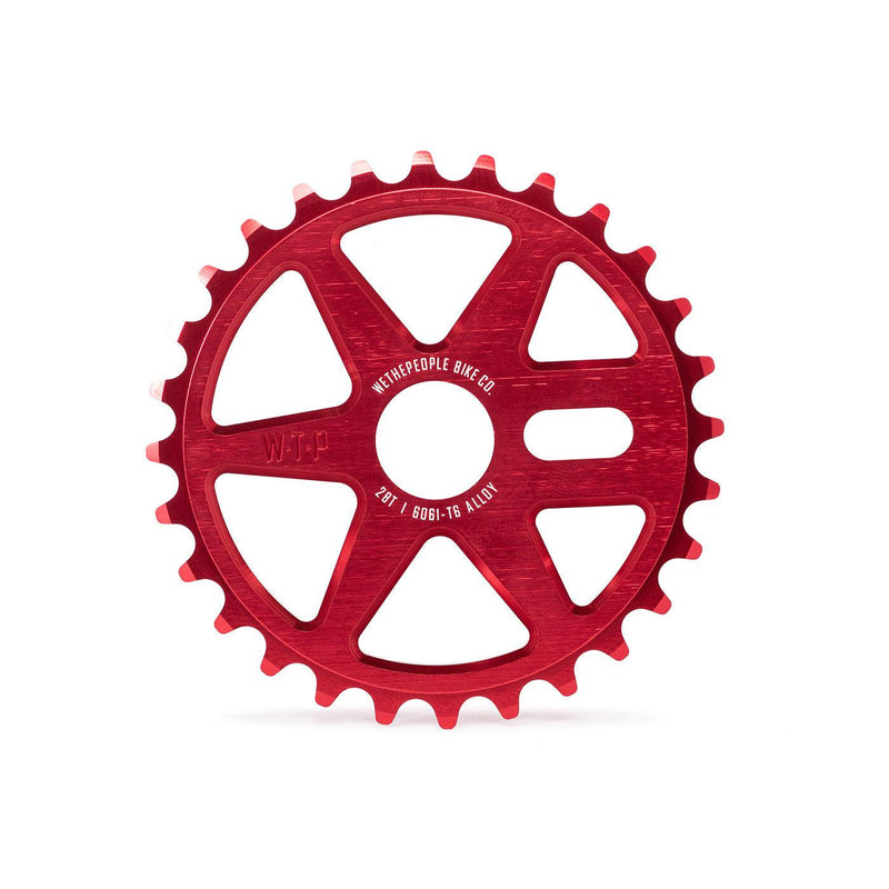 Red WETHEPEOPLE LOGIC SPROCKET made from 6061-T6 alloy with CNC machined design and adaptable sizes 25T or 28T