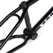 Close-up of black WETHEPEOPLE MESSAGE FRAME BMX bike frame made from lightweight 4130 chromoly tubing with technical park setup features