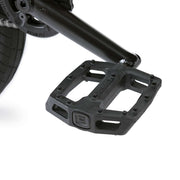 Close-up of black pedal on Wethepeople Justice Bike with sturdy plastic platform and grip pins