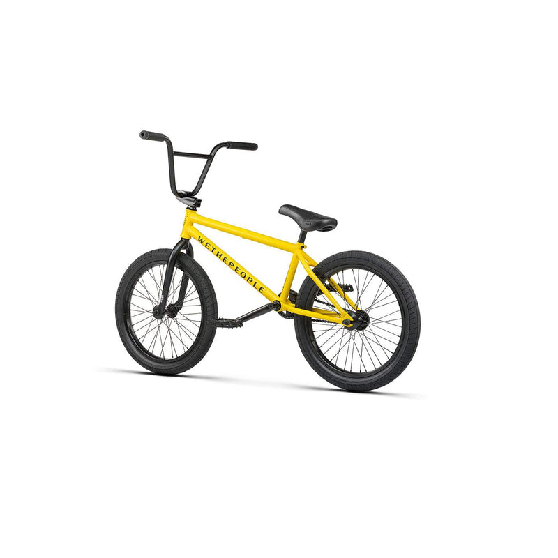 Yellow WETHEPEOPLE JUSTICE BMX bike with black wheels and handlebars on white background