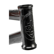 Close-up of black Wethepeople Pathfinder BMX frame head tube with engraved skull logo detailing