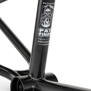 Close-up of black WETHEPEOPLE PATHFINDER BMX frame with Felix Prangenberg signature and detailed welds