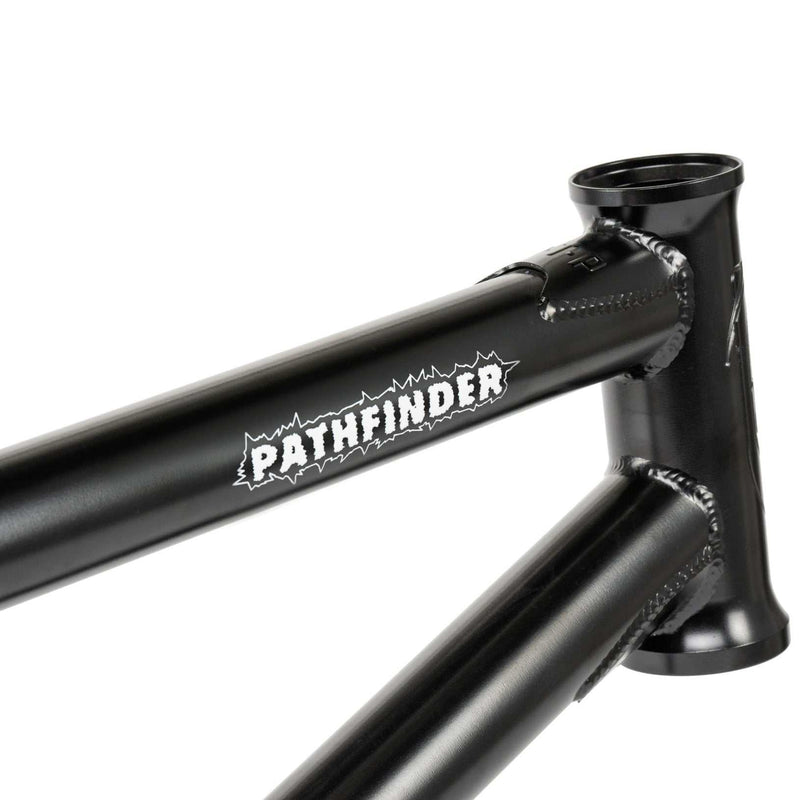 Black WETHEPEOPLE PATHFINDER BMX frame with white logo and CNC machined detailing designed by Felix Prangenberg