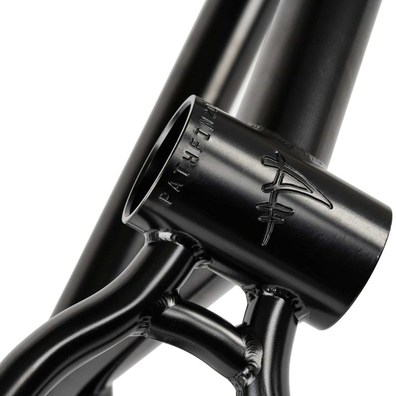 Close-up of black WETHEPEOPLE PATHFINDER BMX frame with engraved logo and strong welds