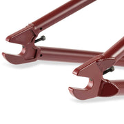 Wethepeople Pathfinder BMX frame dropout section in matt burgundy color with welded joints and integrated chain tensioners.