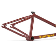 WETHEPEOPLE PATHFINDER BMX bike frame in matt burgundy with yellow logo and reinforced chainstay and bottom bracket shell design