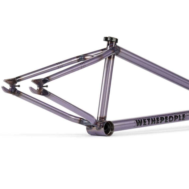 Wethepeople Pathfinder BMX bike frame in translucent purple with CNC detailing and branded graphics