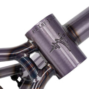 Close-up of Wethepeople Pathfinder Frame head tube with Felix Prangenberg signature in Trans Lilac color showing CNC machined details and welds