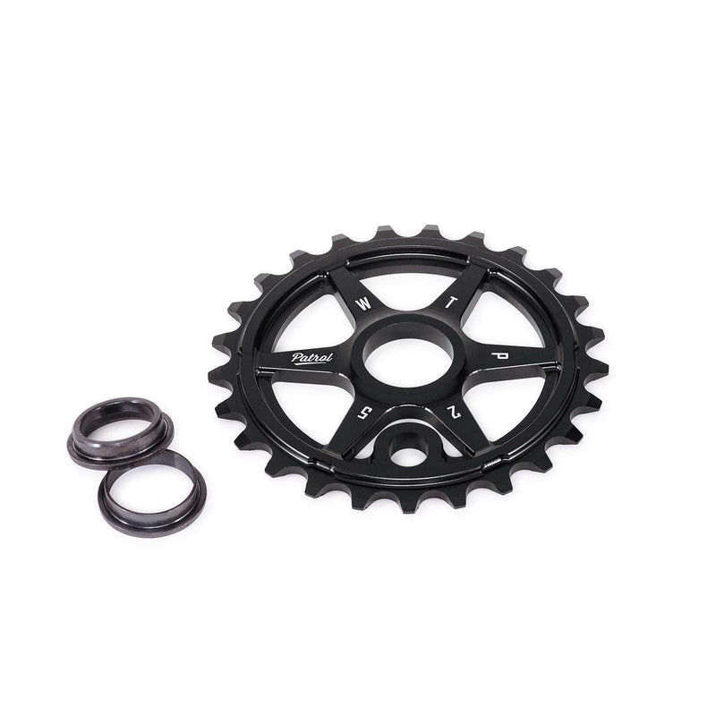 Black WETHEPEOPLE PATROL SPROCKET with offset teeth and adapters for BMX bikes