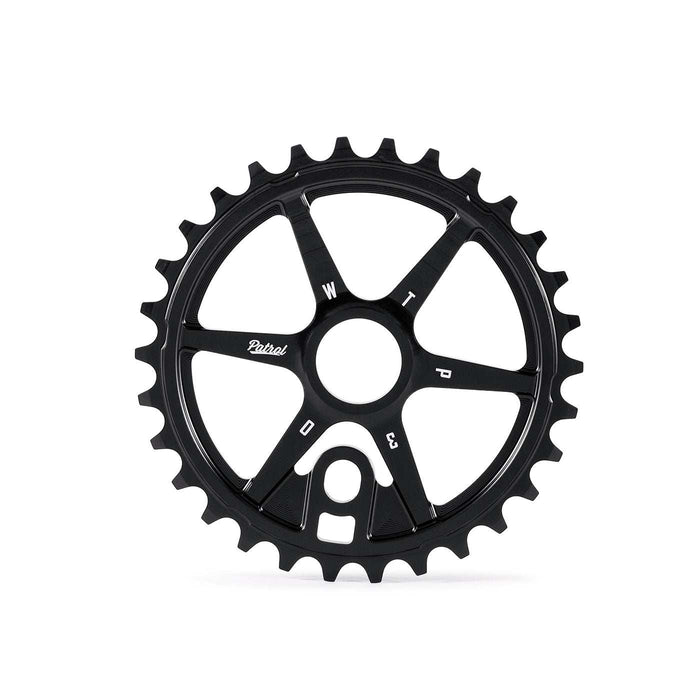 WETHEPEOPLE Patrol sprocket black CNC machined alloy bicycle chainring with offset teeth and classic design.