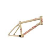 WETHEPEOPLE TRIGGER FRAME beige BMX bike frame with red logo and adaptive geometry design