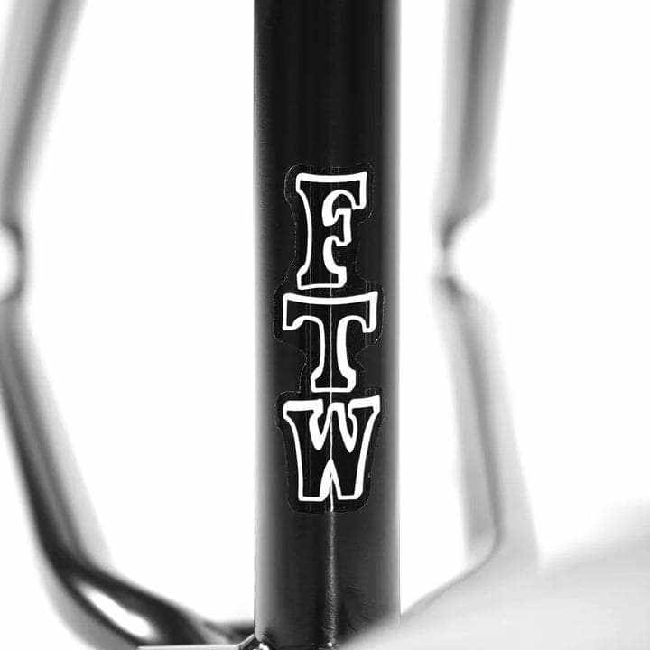 Close-up of black ALIVE INDUSTRY F.T.W. bike frame with bold white FTW logo on the seat tube