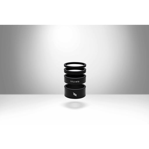 Black aluminum MTB headset spacer kit with 3, 5, 10, and 15mm spacers