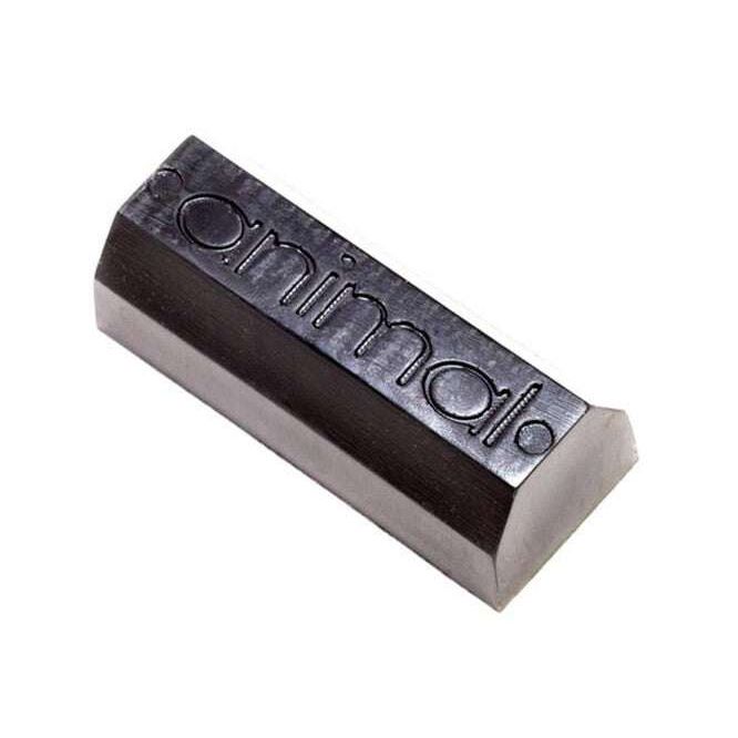 Black Animal Bump Jump Wax bar with embossed branding for optimal board grip and control