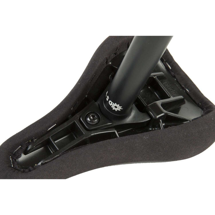 Close-up of black Odyssey Seat Post attached to tripod bike seat showing CNC machined 6061-T6 aluminum construction and mounting bolt.