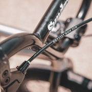 Close-up of Sunday Scout 20" BMX bike frame and Odyssey Quik Slic brake cable