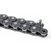 Close-up of BSD 1991 HALFLINK CHAIN with rustproof Teflon coating and stamped BSD logos, compatible with 8t drivers.