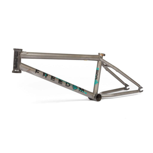BSD Freedom Frame Kriss Kyle signature in raw metal finish with turquoise and black logo graphics, lightweight and sturdy BMX frame designed for versatility and durability.