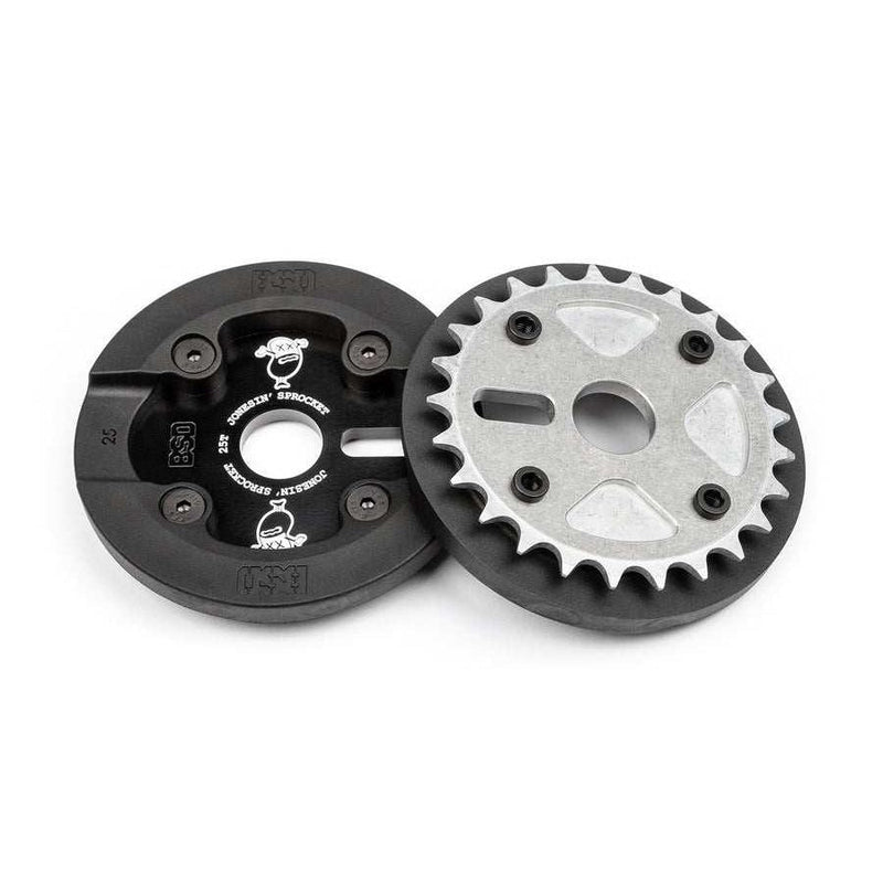 BSD Jonesin' Sprocket 25t made of tough 7075-T6 aluminum with high-density nylon guard and hardened chromo hardware, available in black or raw finish.
