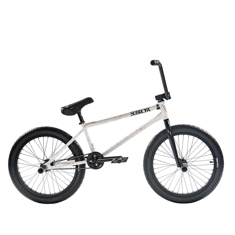SUBROSA LETUM BMX bike with 100% chromoly frame, black wheels, sprocket guard, pegs, and freecoaster hub for street and skatepark riding.