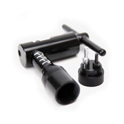 Black CNC machined Cult Chain Tool with detachable handle storing extra driving pins for 410, 510, and Half-link chains.