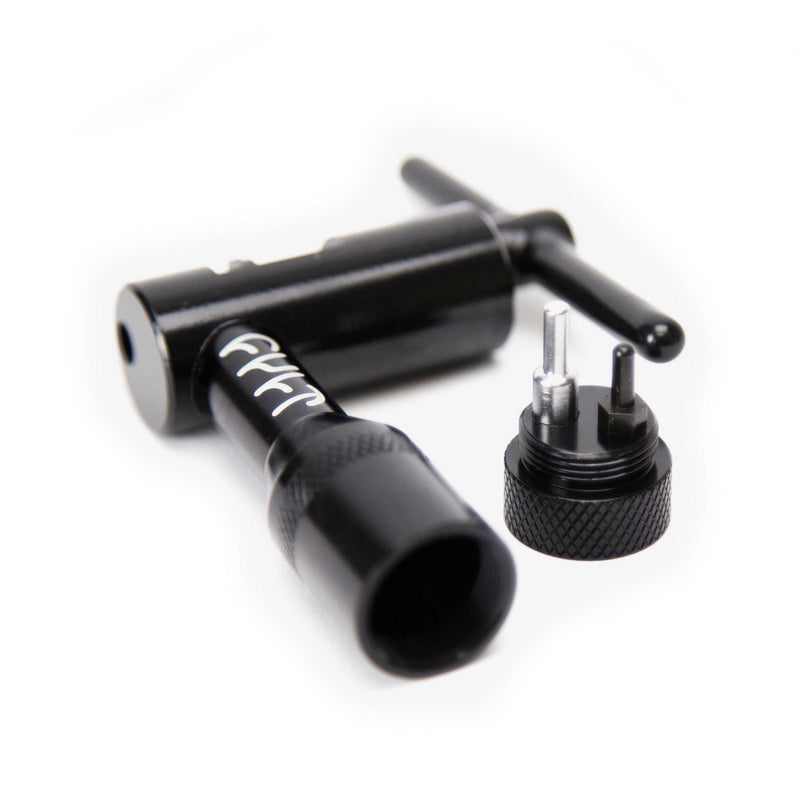 Black CNC machined Cult Chain Tool with detachable handle storing extra driving pins for 410, 510, and Half-link chains.