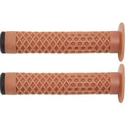Pair of brown Cult VANS waffle grips with flange for BMX bikes, made from soft Krayton rubber.