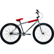 DK Legend 26" BMX bike with chrome looptail frame, red seat and pad set, 26-inch alloy rims, and V-brakes for street and trail riding.