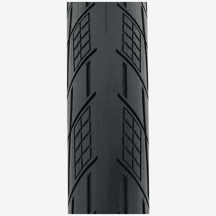 Close-up of TIOGA SPECTR TIRE showing rounded tread with GripPod clusters and deep grooves for enhanced cornering grip.