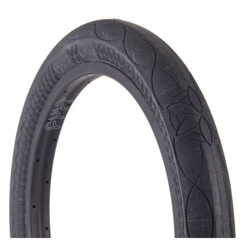 Black CULT AK TIRE Alex Kennedy signature BMX tire with textured tread pattern for street and park riding