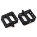 Black PRIMO SUPERTENDERIZER nylon composite bicycle pedals with knurled platforms and molded pins.