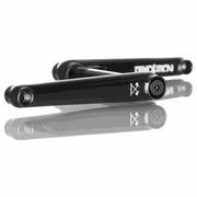 Black Demolition Revolt cranks with heat-treated chromoly arms and forged spindle, designed for durability and stiffness.
