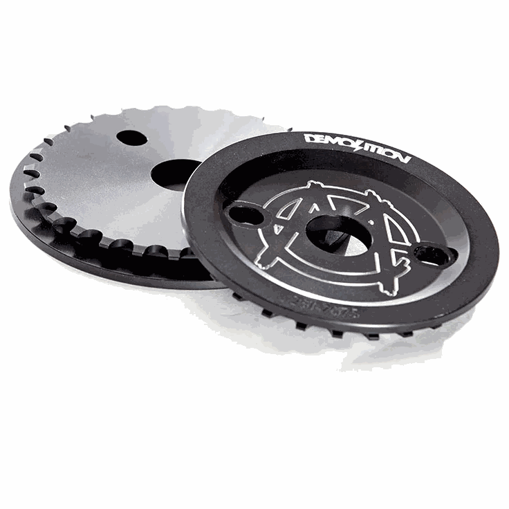 Black Demolition Sprocket Guard Markit V2 made of 3D CNC 7075 aluminum with 24mm bore and crank bolt holes for durable sprocket protection