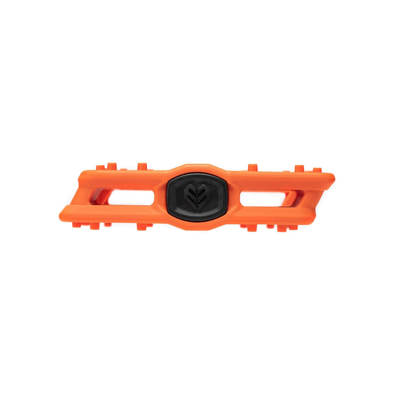 Éclat Centric Pedal with large orange platform and black center for enhanced grip and durability.