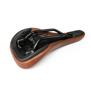 ÉCLAT EXILE X TYSON Railed Seat in faux-leather brown with durable slim design and 8mm hollow crmo rails.