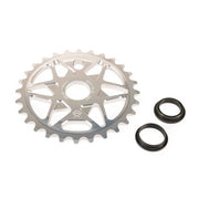 ÉCLAT EXILE CHAINRING sprocket with multi-spoke profile and 7075-T6 alloy, shown with adaptors for various spindle sizes.