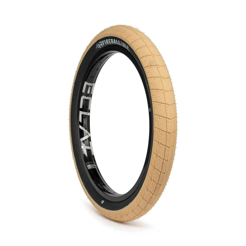 ÉCLAT FIREBALL TIRE with tan tread and black sidewall, designed for street riding, featuring grind-resistant tread and puncture-proof cobweb layer.