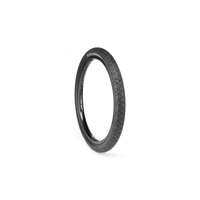Éclat Mugen Tire for BMX flatland riding in black with race-spec rubber compound and ultra-round profile.