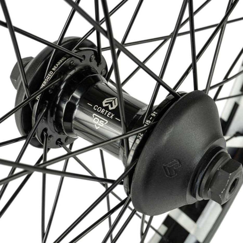 Close-up of ÉCLAT BONDI/CORTEX OS front wheel hub with black stainless steel spokes and sealed bearings