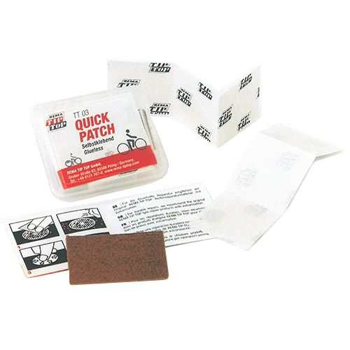 TIP TOP TT3 Quick Patch Kit with self-adhesive TPU patches, sandpaper, and instructions for fast bike tube repairs