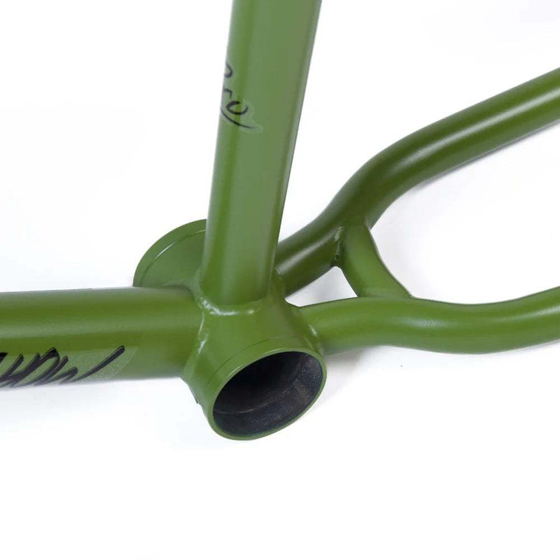 Close-up of green TOTAL BMX TWS 2 PRO Mark Webb signature BMX frame bottom bracket area showing welded tube joints