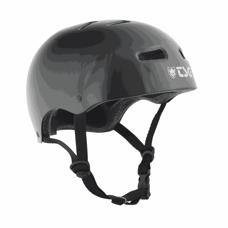 Black TSG Skate/BMX helmet with secure chin straps and ventilation slots designed for skateboarding and BMX riding