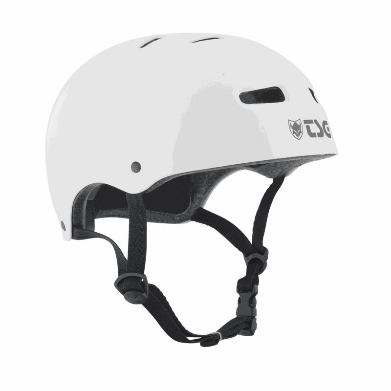 White TSG SkateBMX helmet with black adjustable straps and ventilation holes designed for skateboarding and BMX biking safety.
