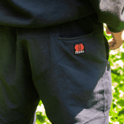 Heavies HENZO navy blue relaxed fit cotton pants with elastic waistband and back pocket logo.