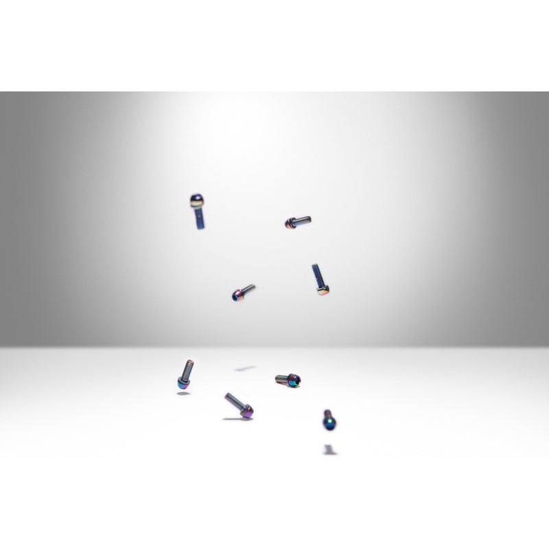 Set of eight oil slick MTB DM1 stem bolts, including four M6 x 18mm and four M6 x 20mm bolts.