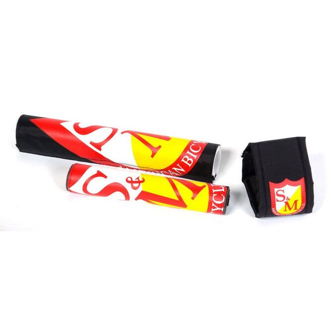 S&M Classic Shield 3-piece bike pad set for frame, handlebars, and stem in red, yellow, and black colors