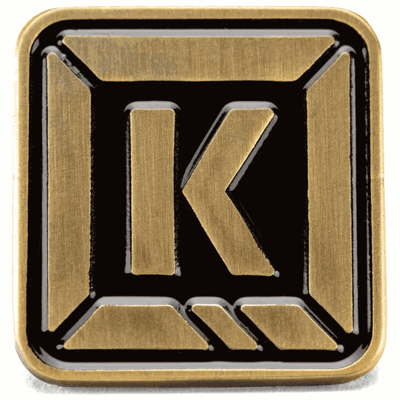 KINK K-BRICK custom-designed enamel pin with butterfly clutch backing in black and gold colors
