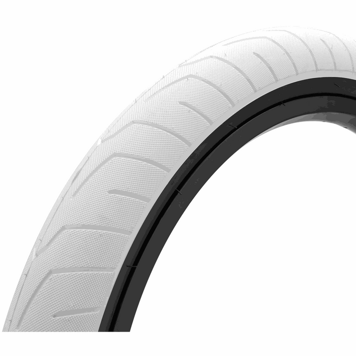 KINK Sever tire with low profile tread and micro-knurled surface for fast roll and high grip, 2.4" width, wire bead, designed for durability and stability.