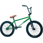 Green Sunday Forecaster BMX bike with brown seat and black tires and handlebars