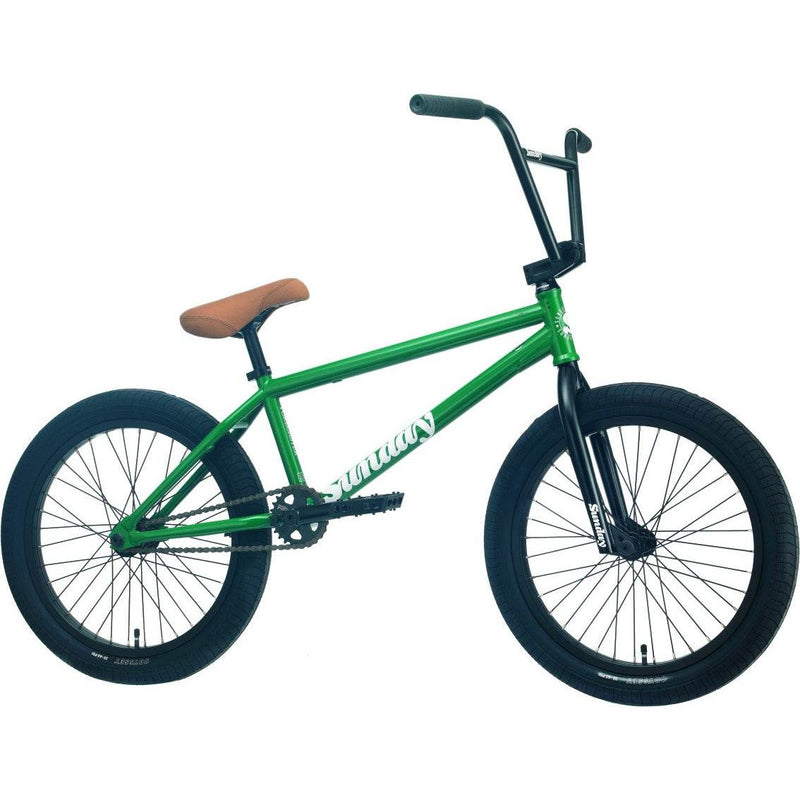 Green Sunday Forecaster BMX bike with brown seat and black tires and handlebars
